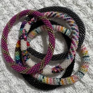 5 Sashka Co handcrafted beaded bracelets. Rainbow and pride colors. Approx 8”.